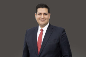 Attorney David Azad solo image with gray background